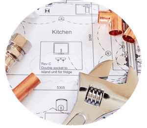 An image of kitchen spanner and screw kept on a architecure plan of kitchen